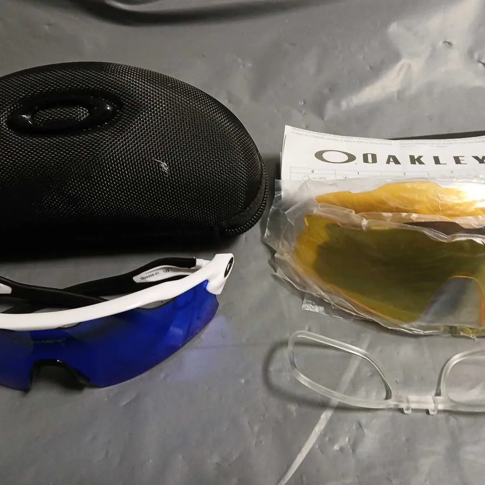 PAIR OF OAKLEY WHITE SPORTS STYLE GLASSES