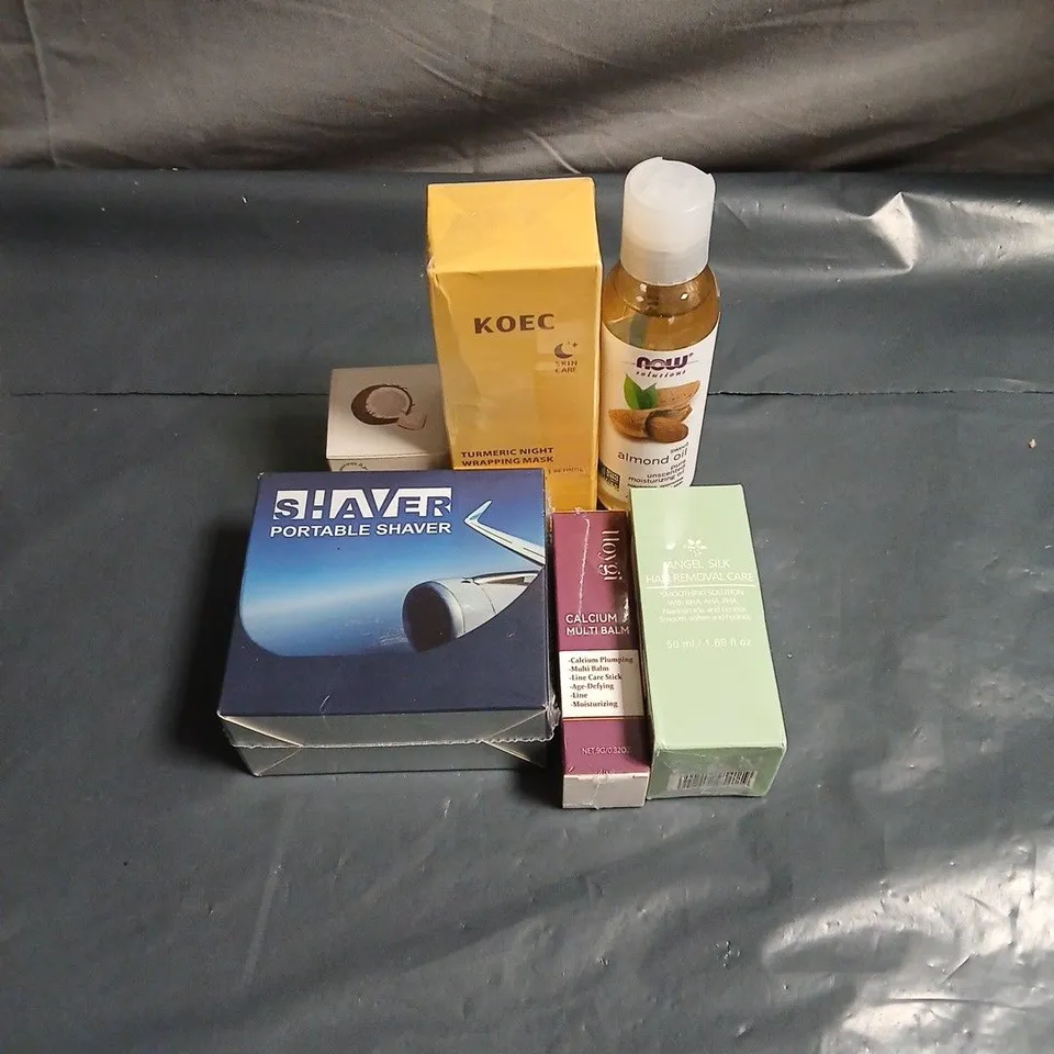 APPROXIMATELY 15 ASSORTED COSMETIC ITEMS TO INCLUDE PORTABLE SHAVER, NIGHT WRAPPING MASK, HAIR REMOVAL CREAM, CALCIUM MULTI BALM, ALMOND OIL ETC