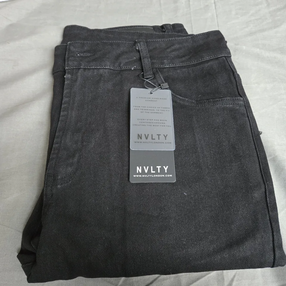 NVLTY VINTAGE HEM ZIPPER JEANS SIZE 34 