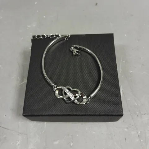 PEACH HEART CROSSED INFINITY BRACELET 