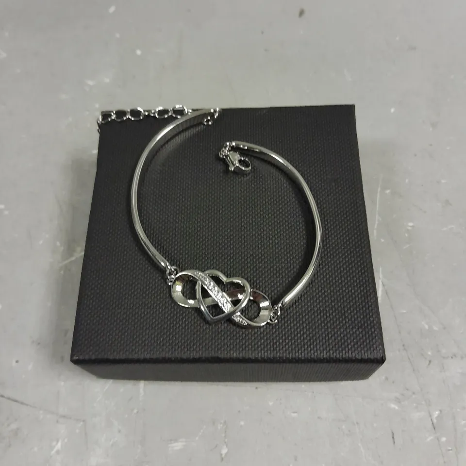 PEACH HEART CROSSED INFINITY BRACELET 