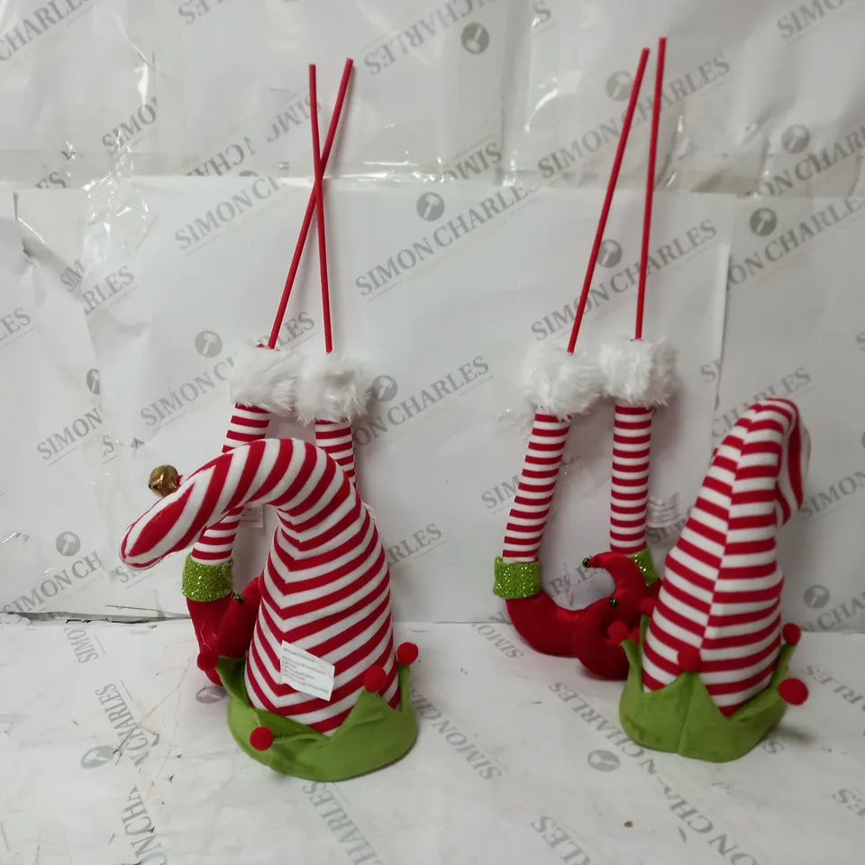 TWO BOXED ELF HAT TREE PICK AND TWO ELF LEG TREE PICKS 