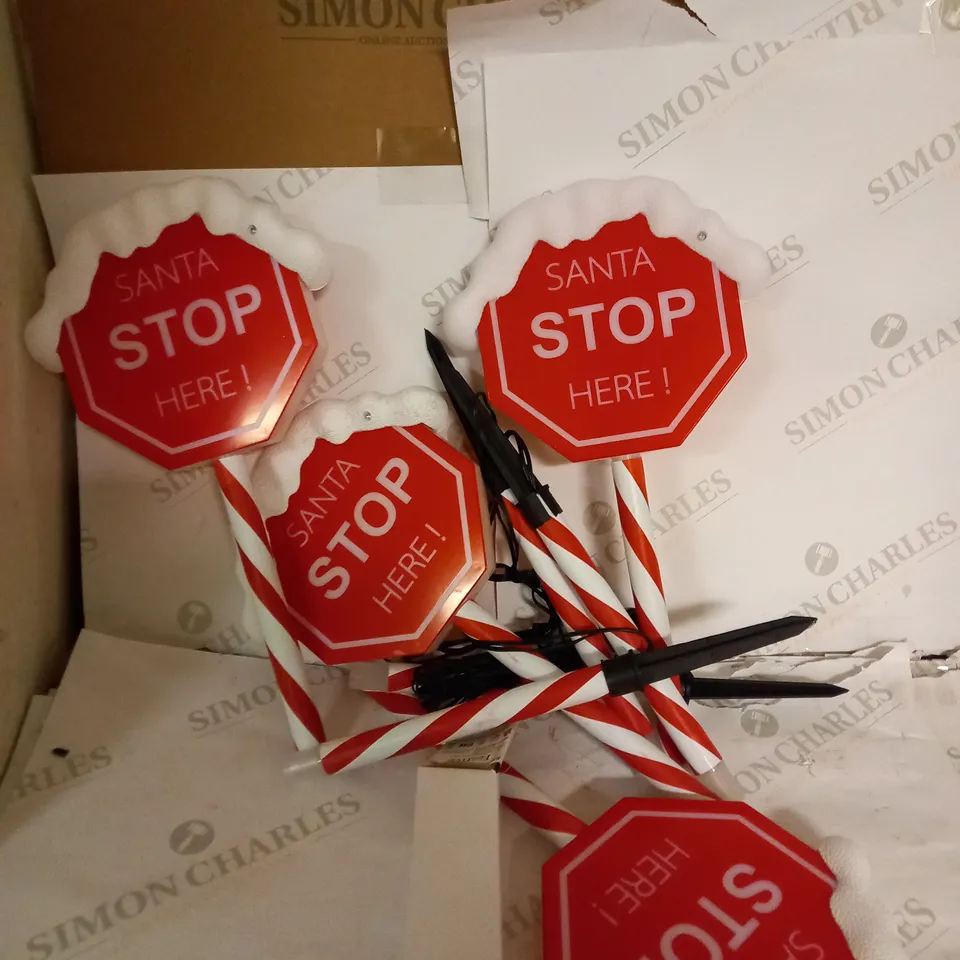 FESTIVE SET OF PRELIT SANTA STOP HERE STAKES
