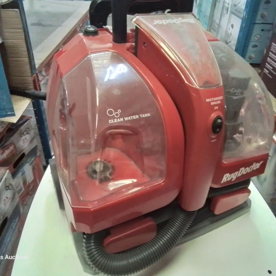 BOXED RUG DOCTOR PORTABLE SPOT CLEANER