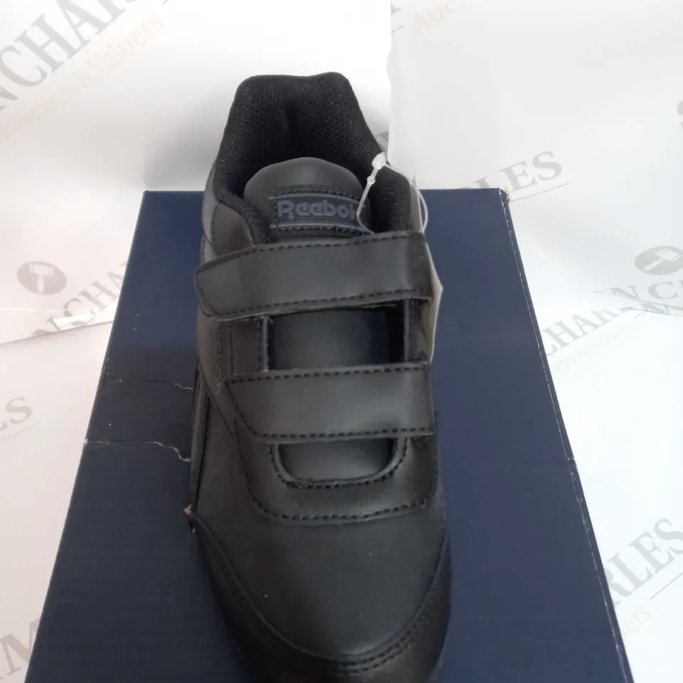 BOXED PAIR OF KIDS REEBOK ROY IN BLACK SIZE 12.5 