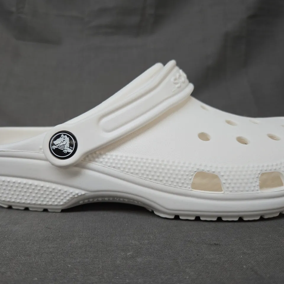 PAIR OF CROCS CLASSIC CLOGS IN MILK WHITE UK SIZE M5/W6