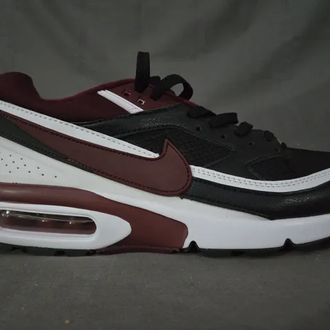 PAIR OF NIKE AIR INTERNATIONAL BEIJING SHOES IN WHITE/BURGUNDY/BLACK UK SIZE 10