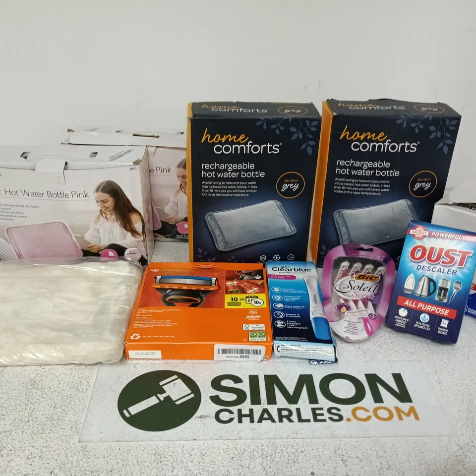 LOT OF APPROXIMATELY 20 ASSORTED HOUSEHOLD ITEMS TO INCLUDE HOT WATER BOTTLES, RAZER BLADES AND OUST DESCALER