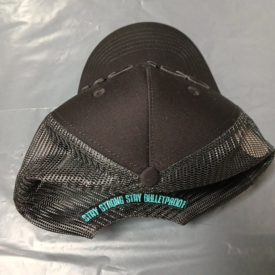 BLACK TRUCKER CAP WITH MESH BACK AND TEAL SLOGAN EMBROIDERY