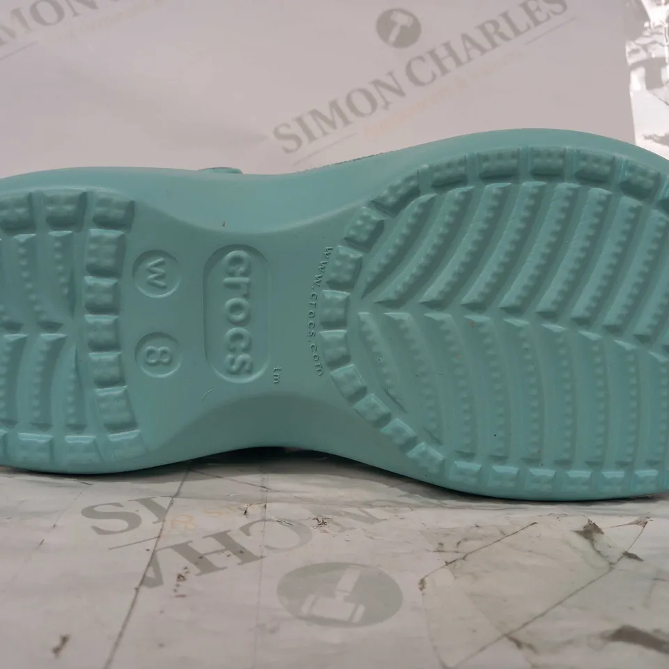 BOXED PAIR OF CROCS IN LIGHT BLUE SIZE W8
