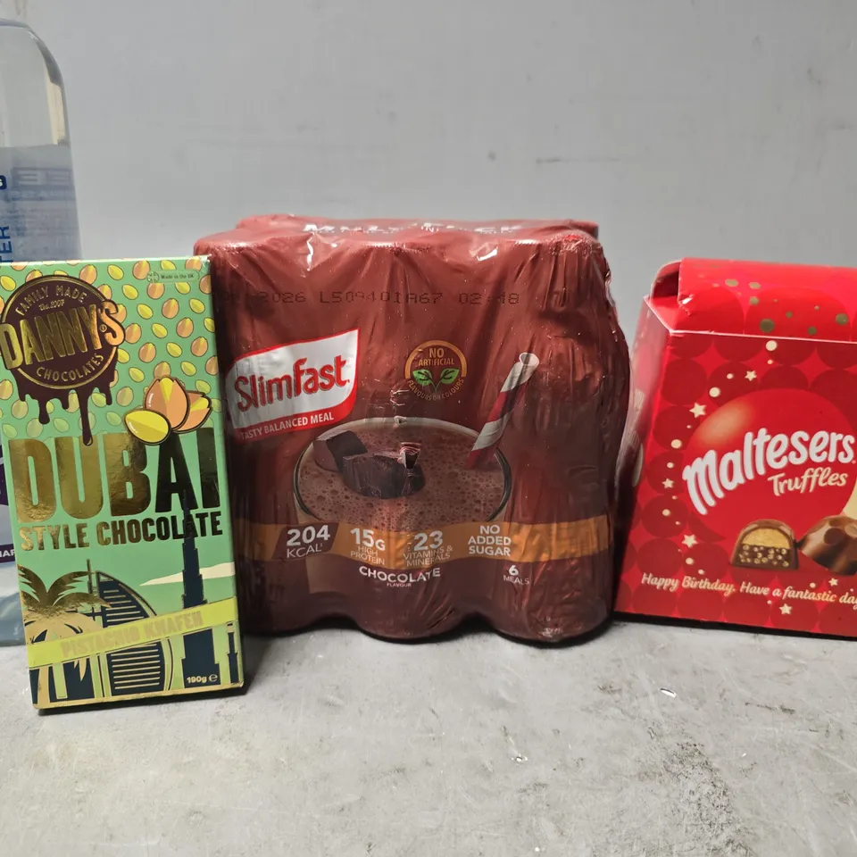APPROXIMATELY 7 ASSORTED FOOD & DRINK ITEMS TO INCLUDE - MALTESERS TRUFFLES , SLIMFAST , DUBIA STYLE CHOCOLATE ETC