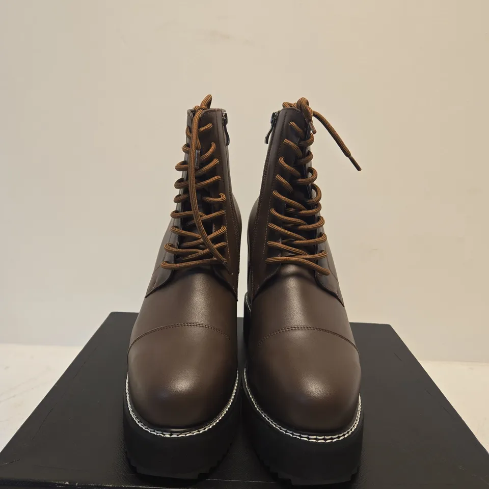 BOXED PAIR OF CHAMARIPA HIGH WEDGE BROWN BOOTS - SIZE UNSPECIFIED