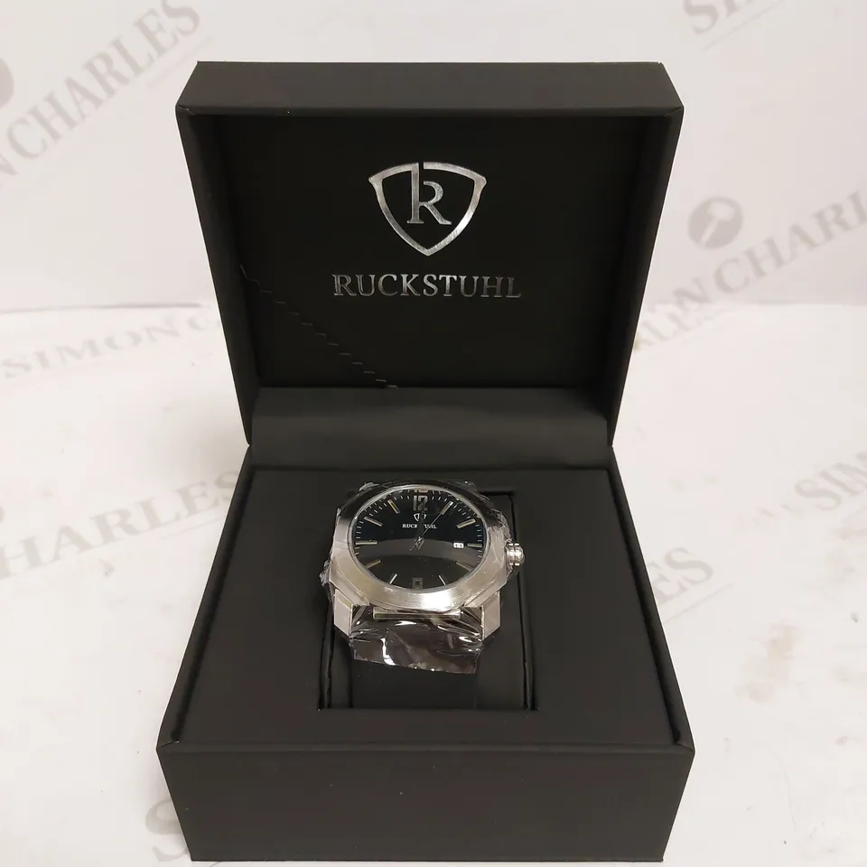 MEN’S RUCKSTUHL R180 WATCH – DATE FUNCTION – BLACK DIAL – CURVED SCRATCH RESISTANT CRYSTAL GLASS – RUBBER STRAP 