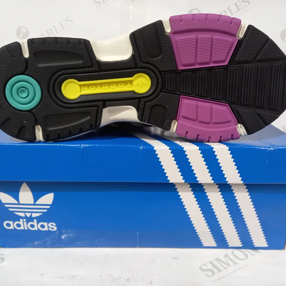 BOXED PAIR OF ADIDAS RETROPY F90 TRAINERS IN OFF WHITE/PURPLE/GREEN UK SIZE 9