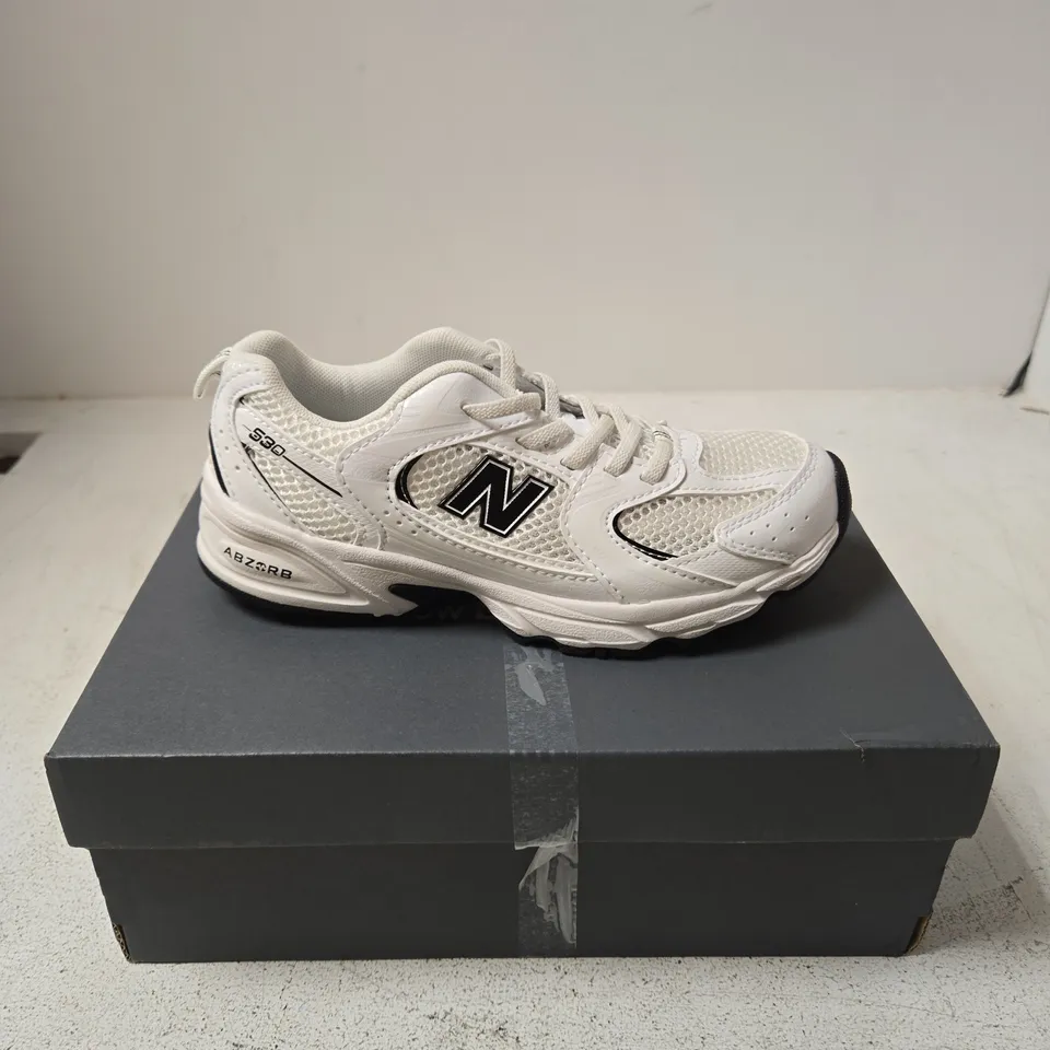 NEW BALANCE CHILDRENS WHITE TRAINERS - 33