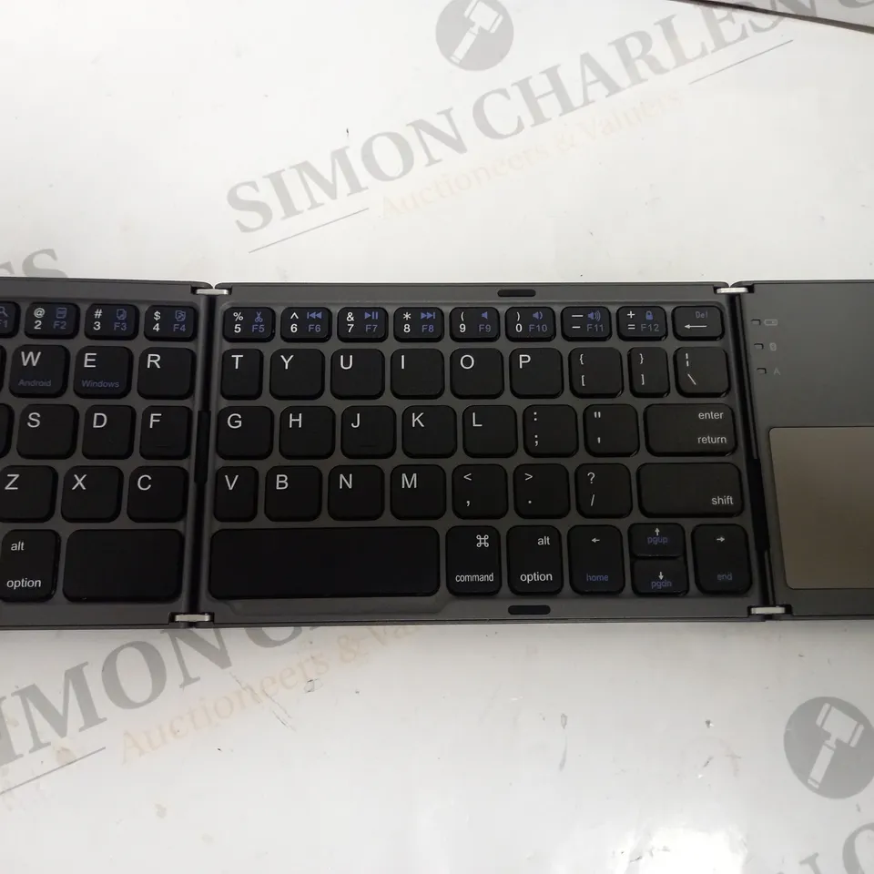 FOLDABLE WIRELESS BLUETOOTH KEYBOARD WITH MOUSE PAD