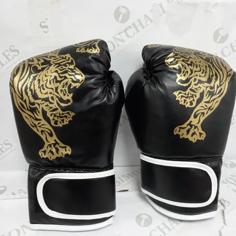 PAIR OF BLACK BOXING GLOVES WITH GOLD DETAIL