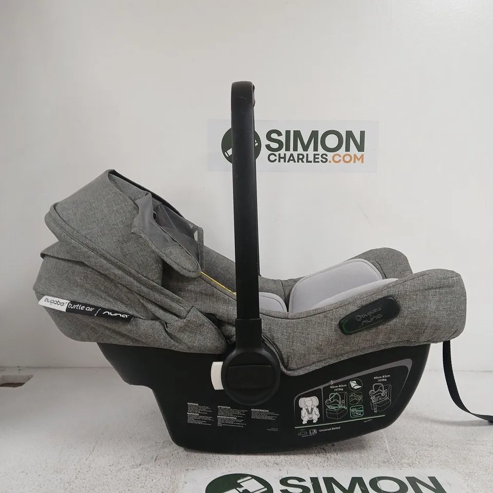 NUNA INFANT CAR SEAT – GREY FABRIC WITH ADJUSTABLE CARRY HANDLE
