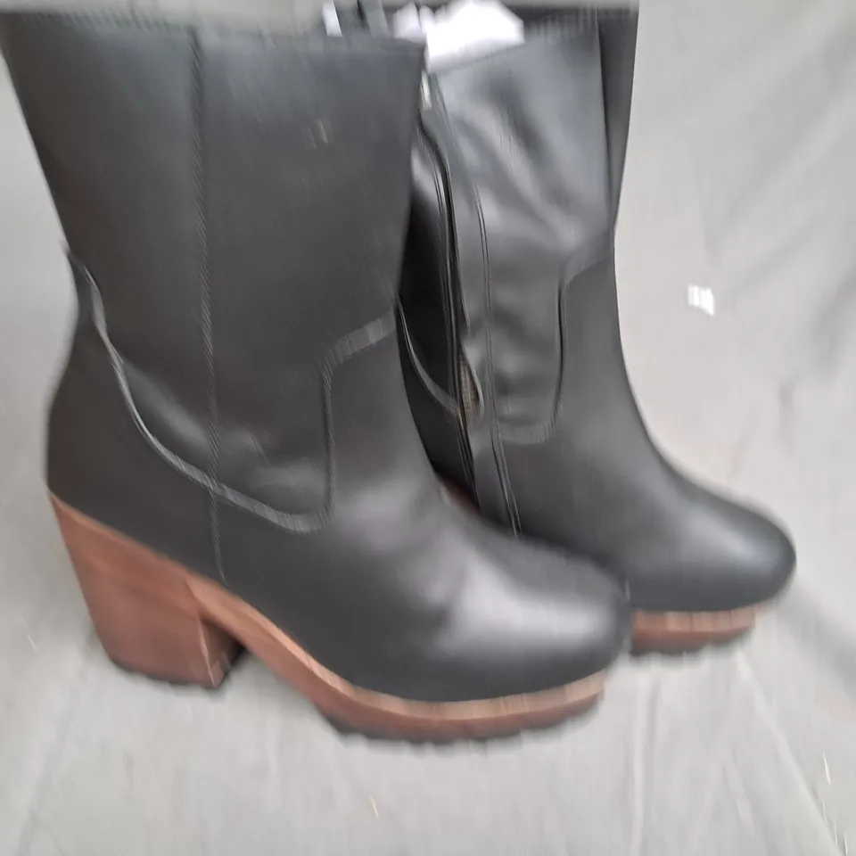 BOX OF APPROXIMATLY 5 WOODEN BOTTOM LEATHER BOOT VARIOUS SIZES 