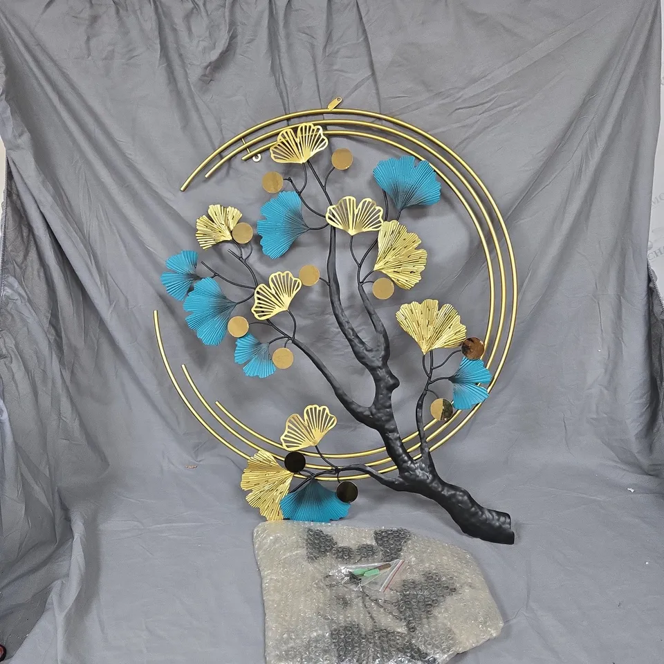 METAL WALL SCULPTURE: TREE WITH BLUE AND GOLD LEAVES INSIDE CIRCULAR RINGS