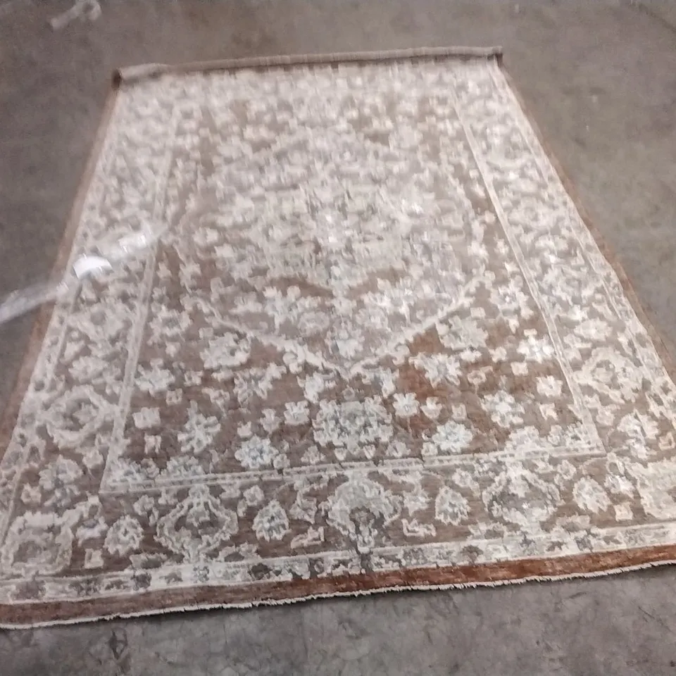 STILLAGE OF APPROXIMATELY 12 DESIGNER RUGS