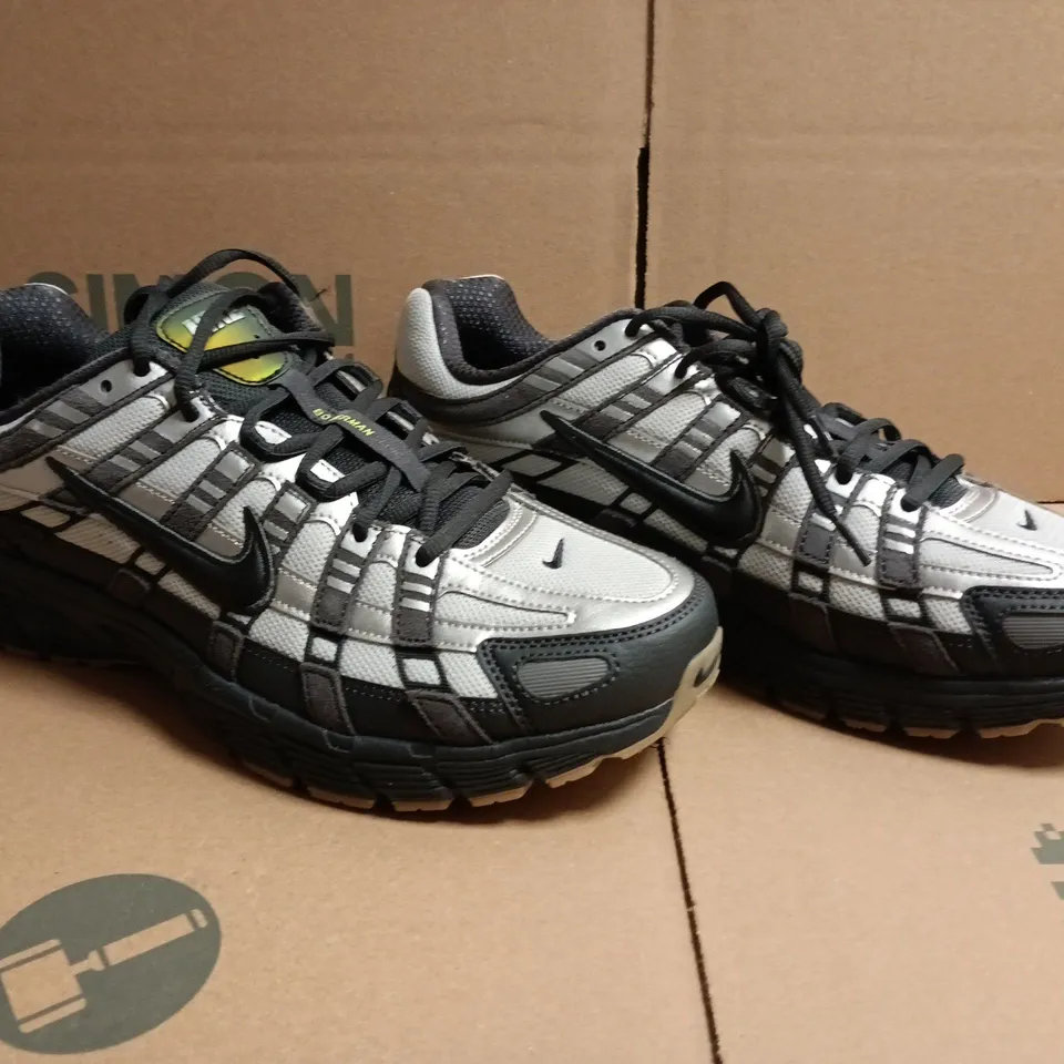 PAIR OF NIKE P-6000 TRAINERS IN GREY/SILVER/BLACK SIZE UK 11