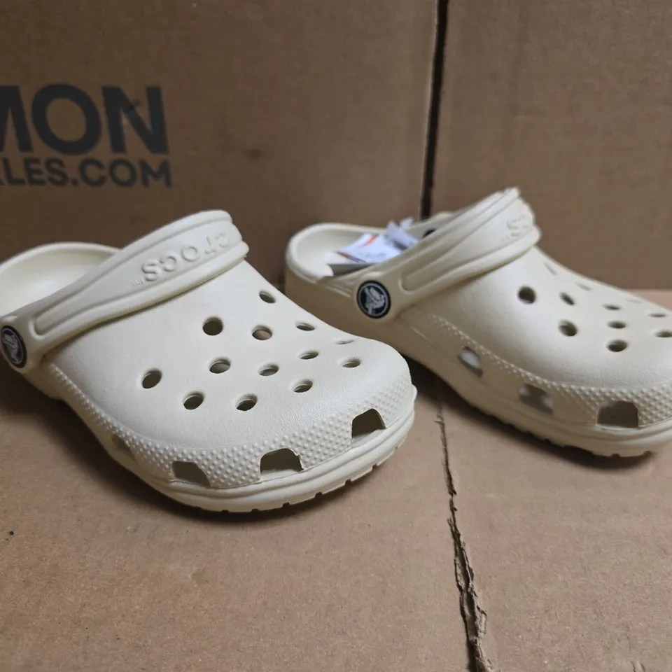 PAIR OF CROCS CLASSIC KID'S CLOGS IN BEIGE SIZE UK C11