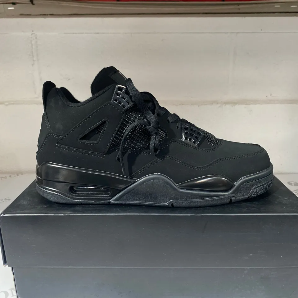 BOXED PAIR OF AIR JORDAN 4 RETRO BLACK TRAINERS SIZE 9