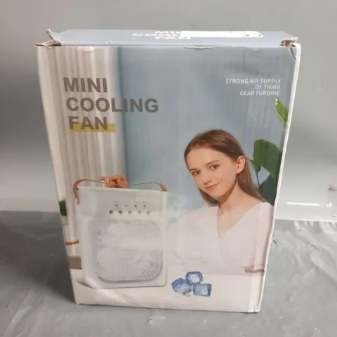 THREE BOXED MINI COOLING FANS