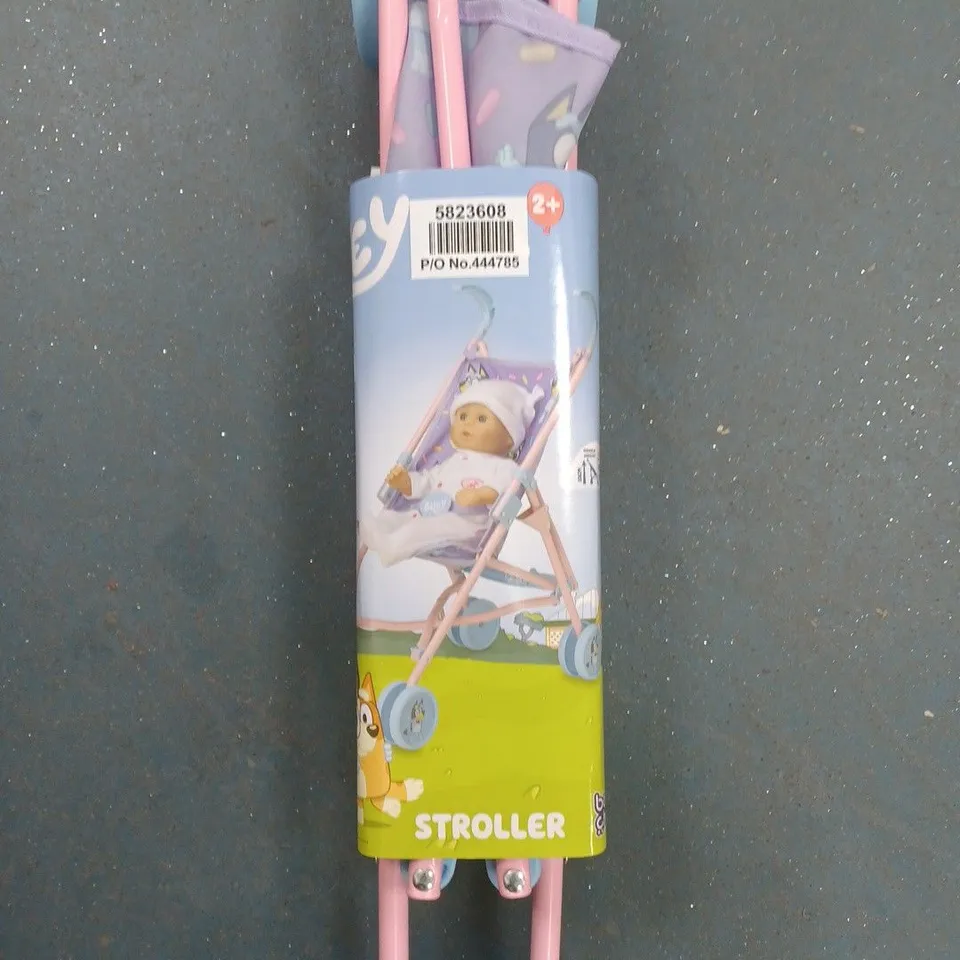 BOX OF APPROXIMATELY 12 BLUEY DOLL STROLLERS