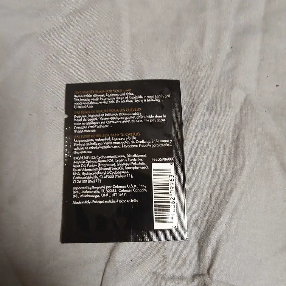 BOX OF APPROXIMATELY 250 OROFLUIDO BEAUTY ELIXIR HAIR OIL – SACHET PACK-NO EXPIRY DATE SHOWN 