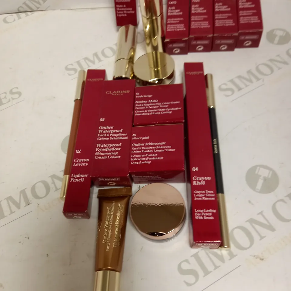 LOT OF APPROX 9 TO INCLUDE CLARINS IRIDESCENT EYESHADOW , CLARINS MOISTURIZING SHEER LIPSTICK , ETC