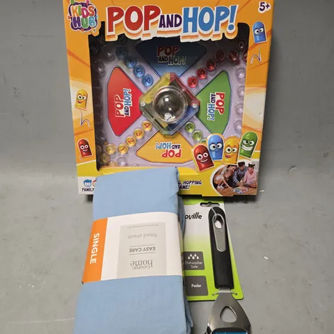 LARGE BOX OF APPROXIMATELY 10 ASSORTED ITEMS TO INCLUDE CUSHIONS, FITTED SHEETS, GAMES AND PEELERS