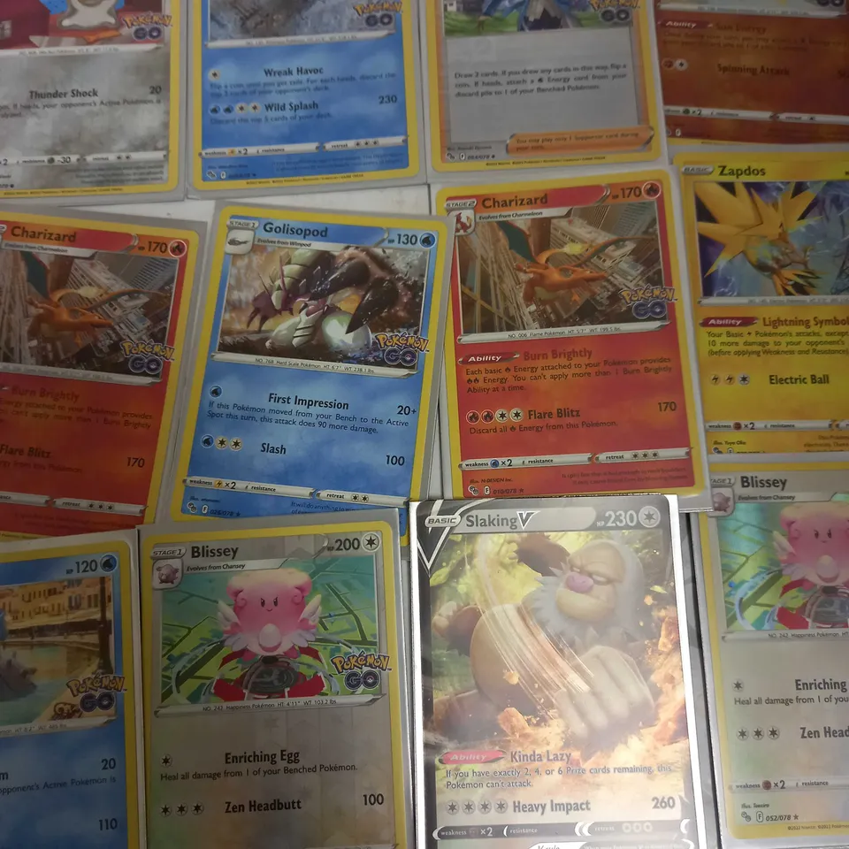 LOT OF 24 ASSORTED POKEMON CARDS