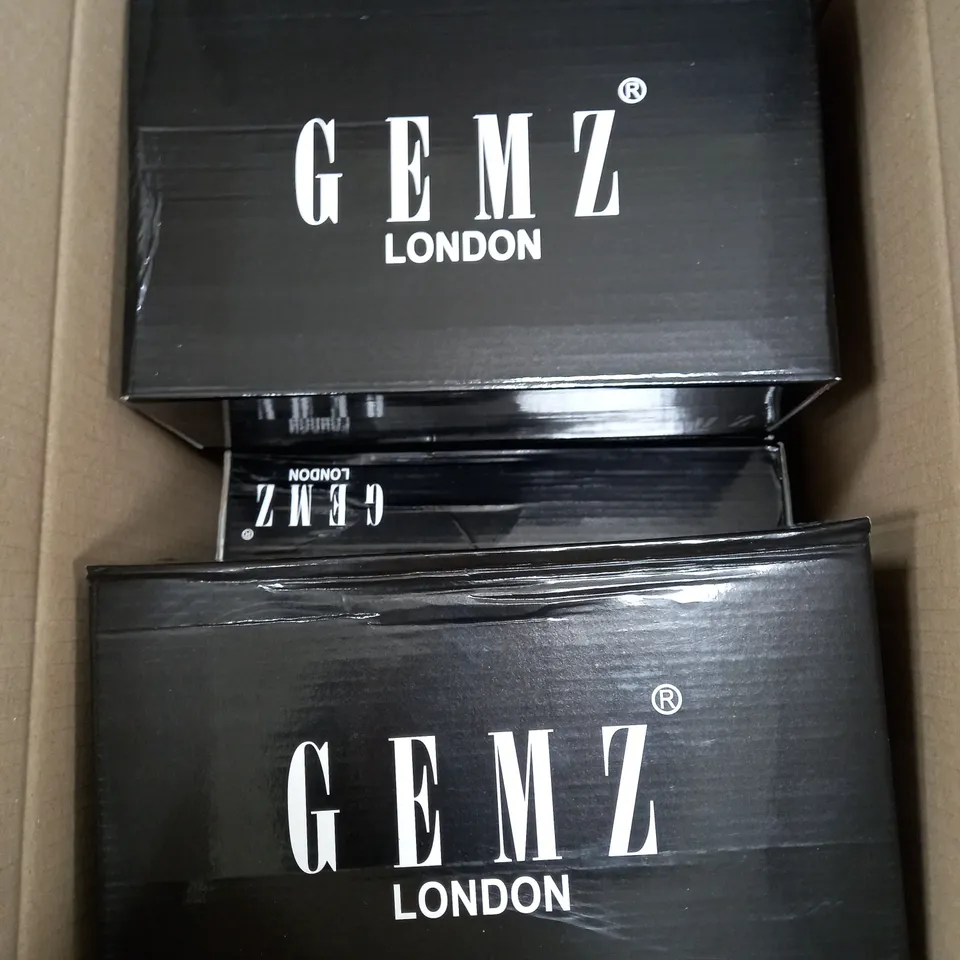 BOX OF APPROXIMATELY 5 GEMZ LONDON GOLD GEM HEELS 