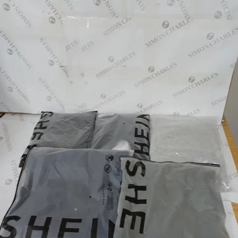 LARGE BOX OF ASSORTED CLOTHING ITEMS IN VARIOUS COLOURS AND SIZES INCLUDING TROUSERS , TOPS AND JUMPERS