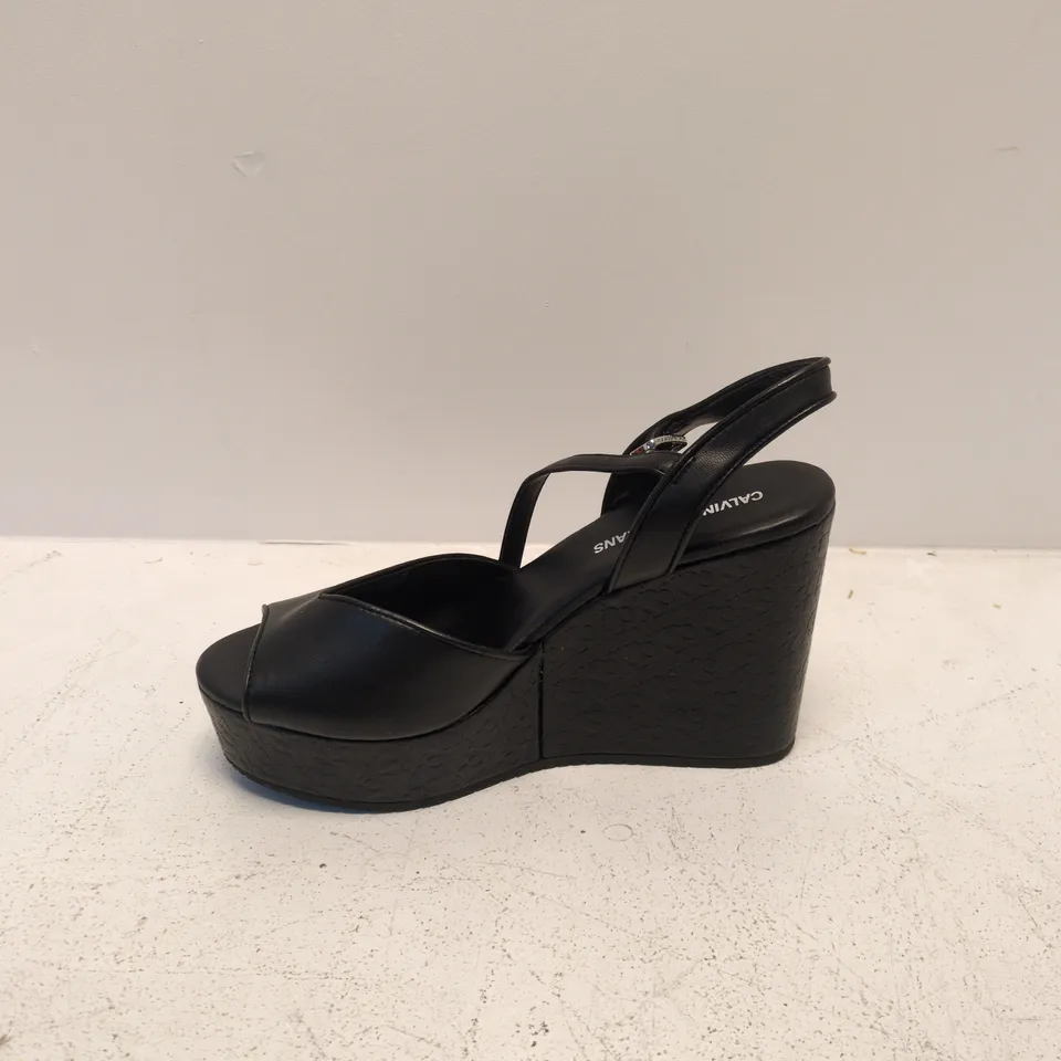 CALVIN KLEIN JEANS BLACK WEDGE SANDALS – ANKLE STRAP