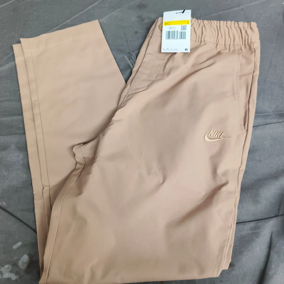 NIKE STANDARD FIT TAPER LEG PANTS IN SAND - SMALL