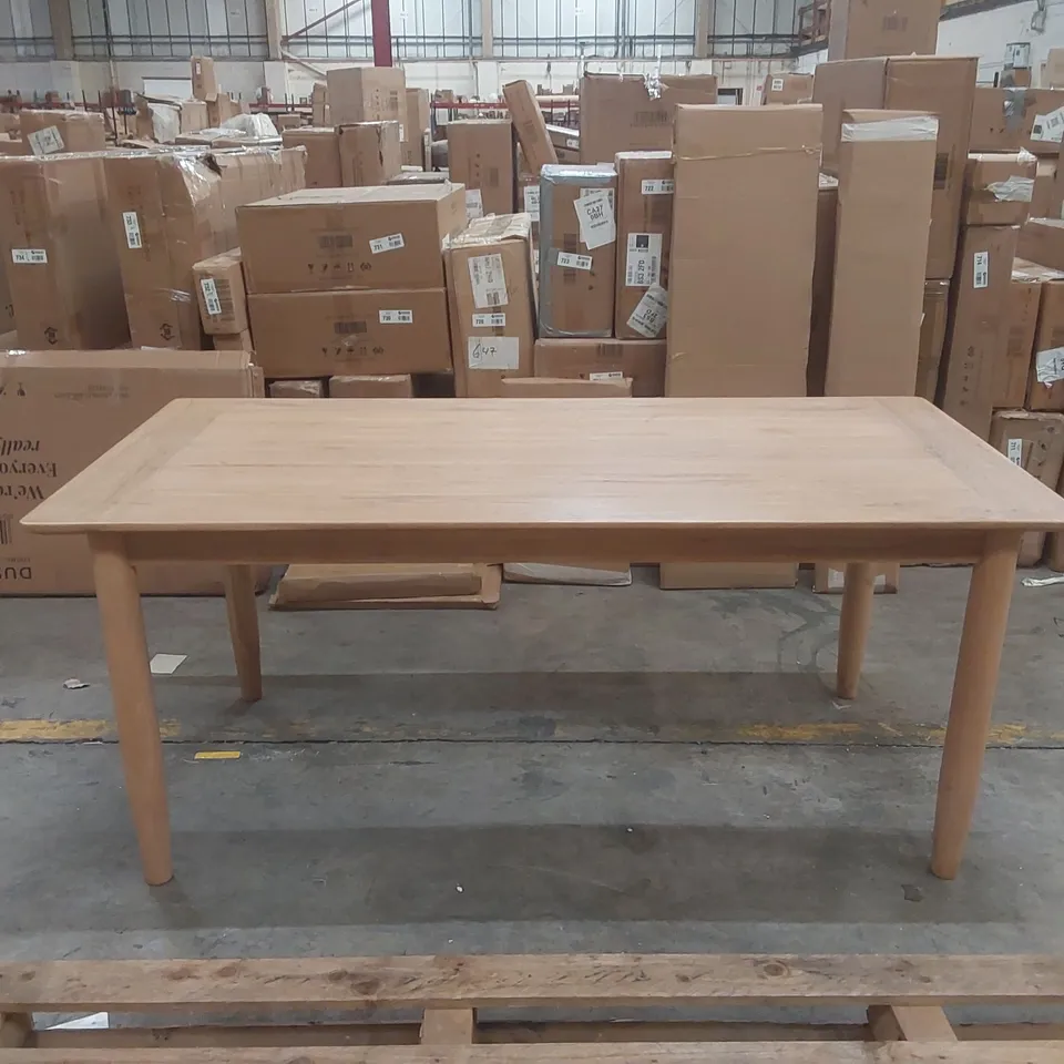 DESIGNER SOLID WOOD DINING TABLE