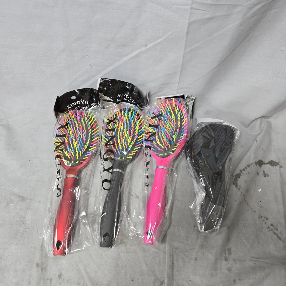 BOX OF APPROXIMATELY 50 HAIRBRUSHES IN ASSORTED COLOURS AND DESIGNS