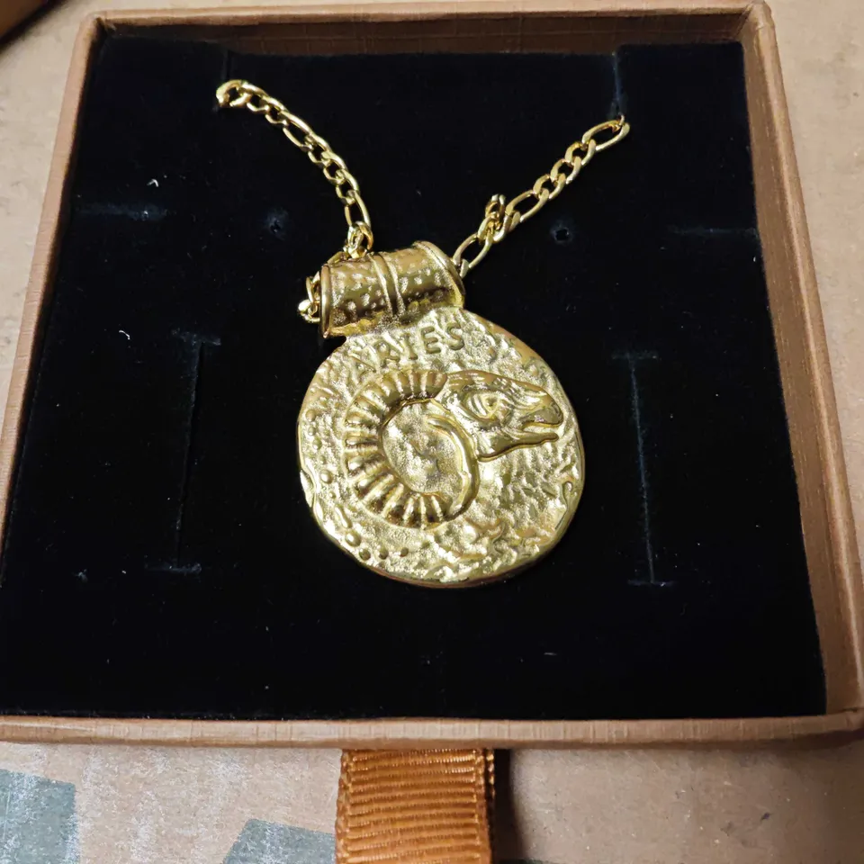 BOXED DORSYA GOLD TONE NECKLACE WITH ARIES THEMED PENDANT
