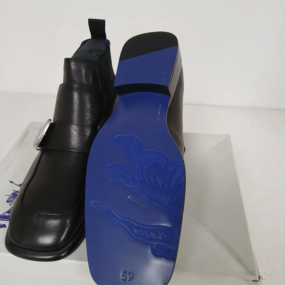 BURBERRY SHIELD BOOT – BLACK LEATHER CHELSEA BOOT WITH SILVER SHIELD BUCKLE, UK 11 (EU 45)