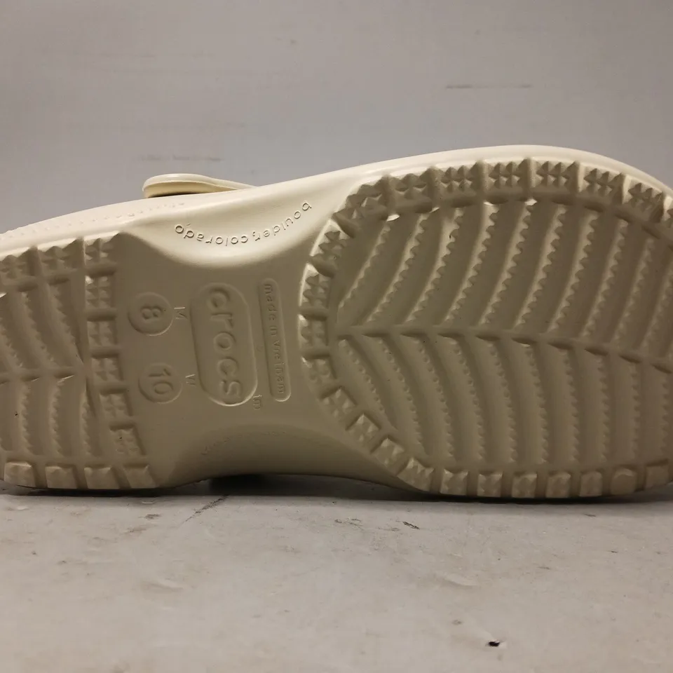 PAIR OF CROCS CLOGS IN BONE UK SIZE 7