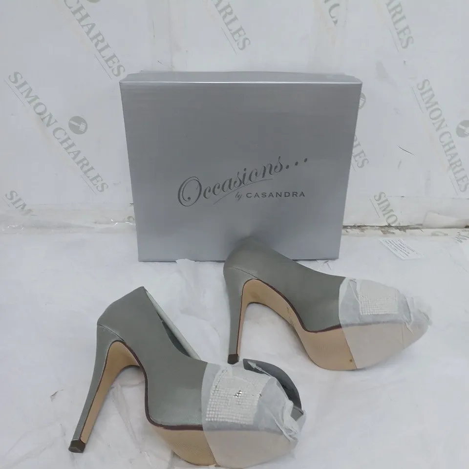 LARGE BOX OF APPROXIMATELY 10 BOXED OCCASIONS SILVER OPEN TOE HEEL IN VARIOUS SIZES 