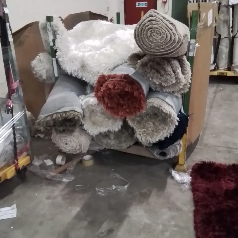 STILLAGE OF APPROXIMATELY 20 QUALITY DESIGNER RUGS