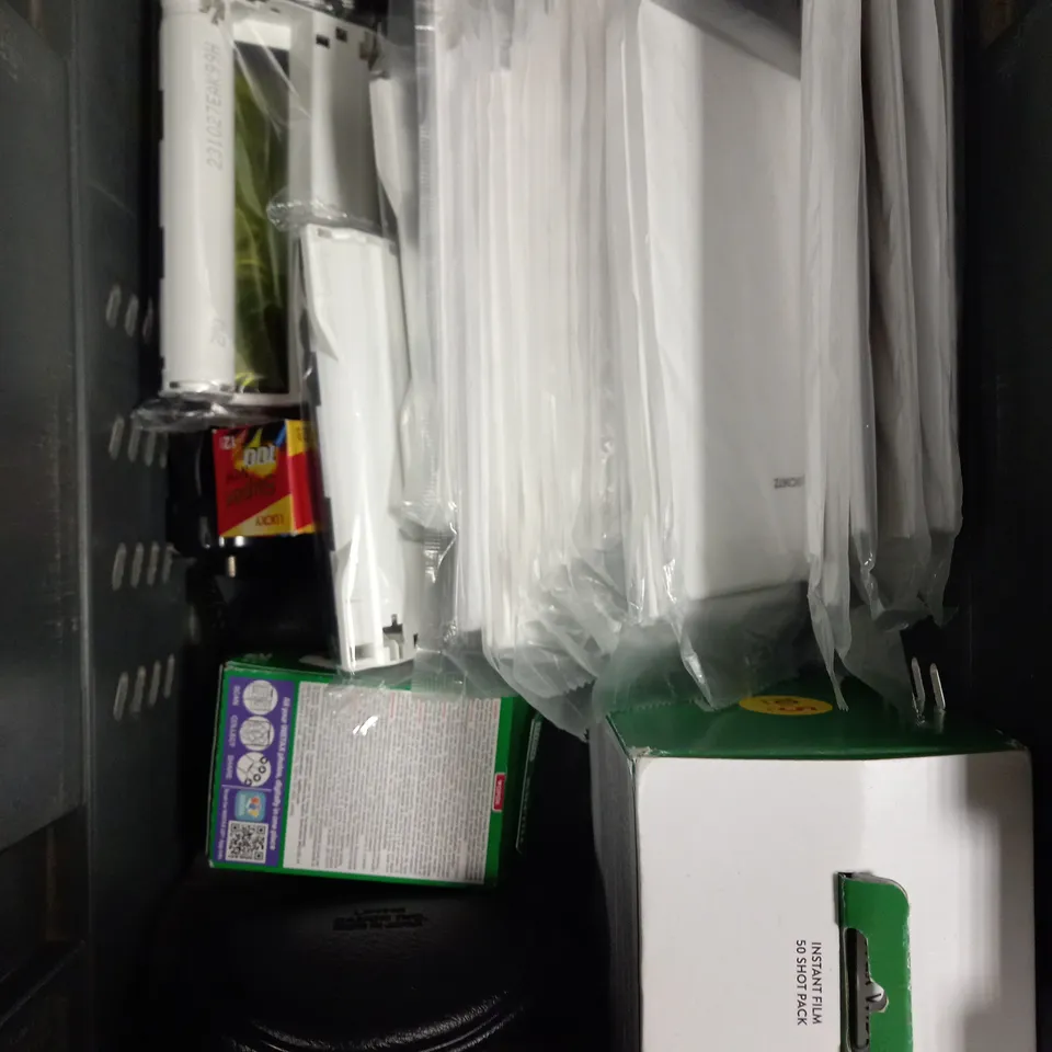 APPROXIMATELY 10 ASSORTED CAMERA ACCESSORIES TO INCLUDE PHOTO PAPER, FILM, COVER CASE ETC 