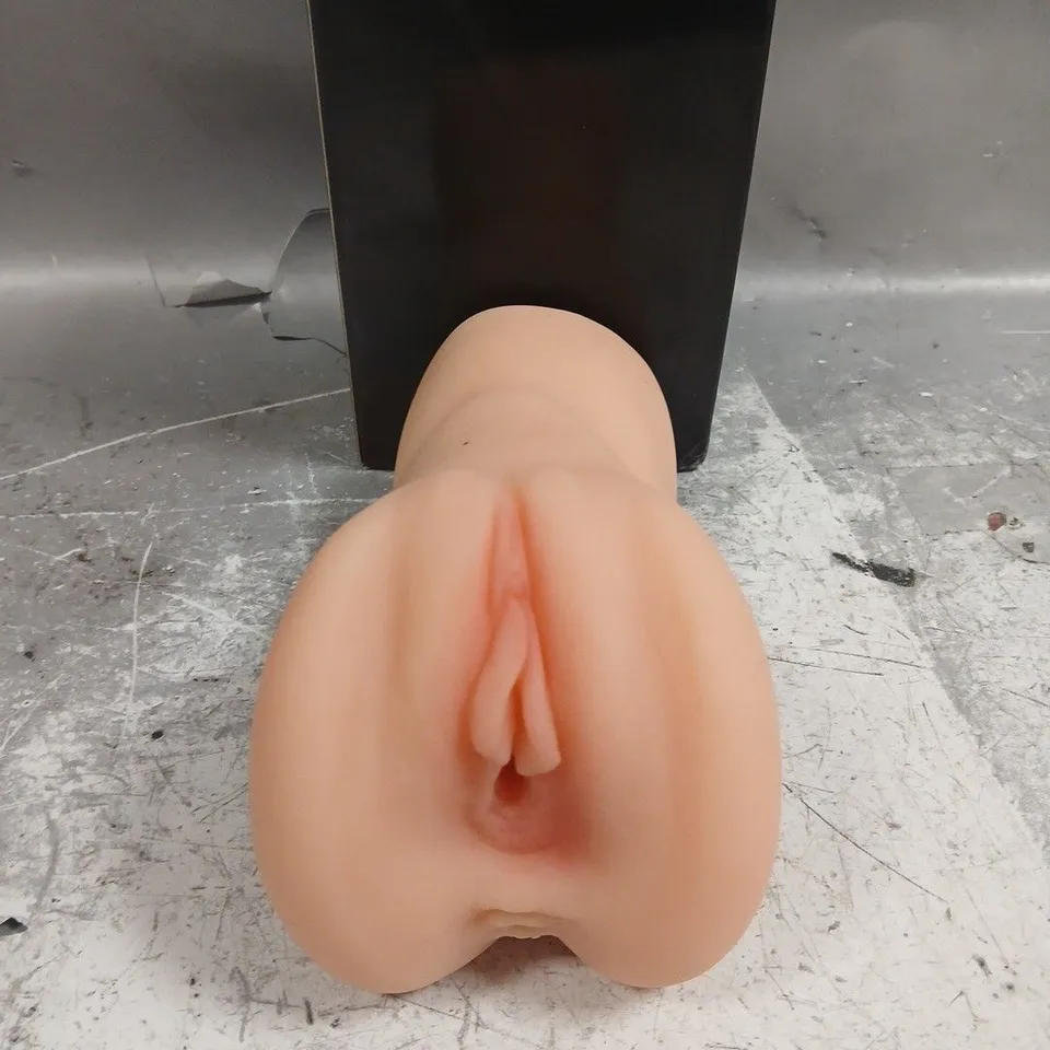BOXED SILICONE MASTURBATOR WITH HAND GRIP
