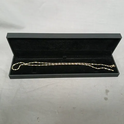STERLING SILVER AND 9CT GOLD PLATE NECKLACE IN BLACK CASE