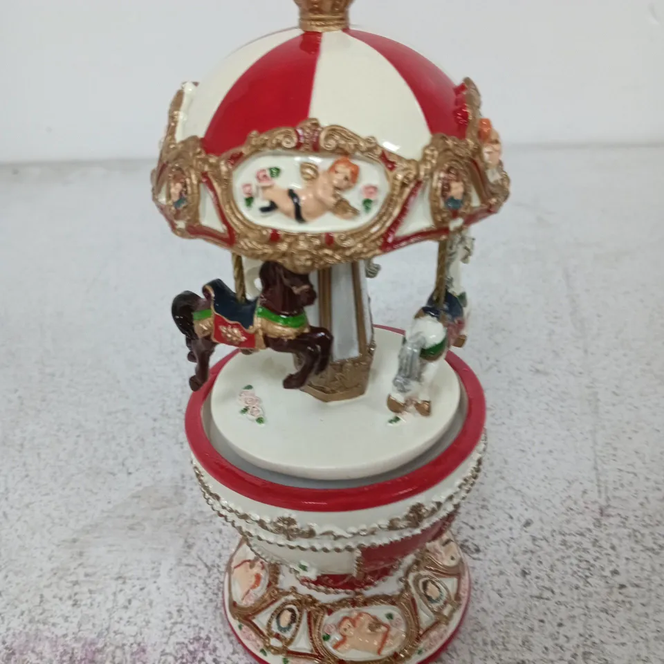 HEAVEN SENDS EGG SHAPED MERRY GO ROUND CHRISTMAS DECORATION