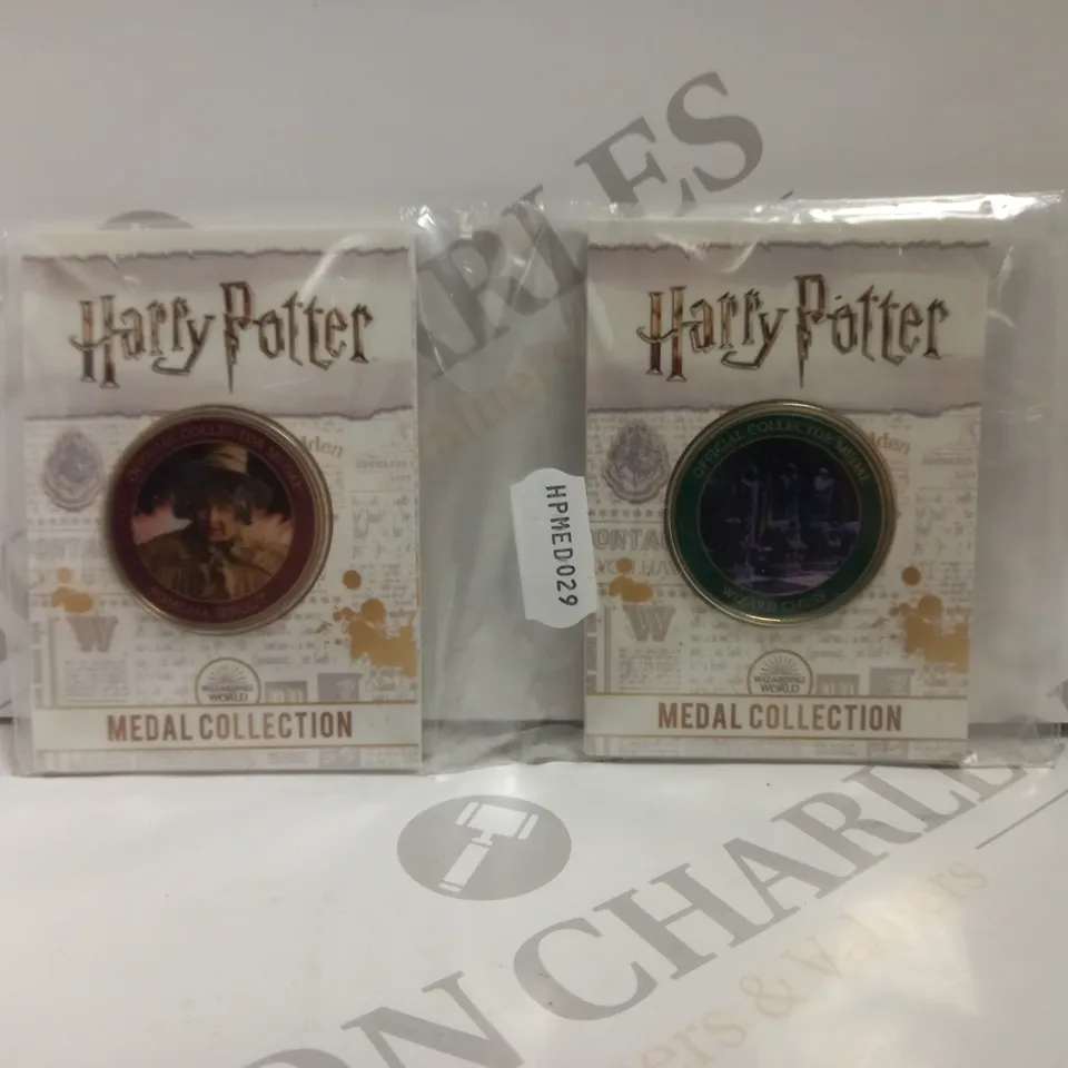LOT TO CONTAIN 4 X ASSORTED HARRY POTTER MEDALS. DESIGNS VARY